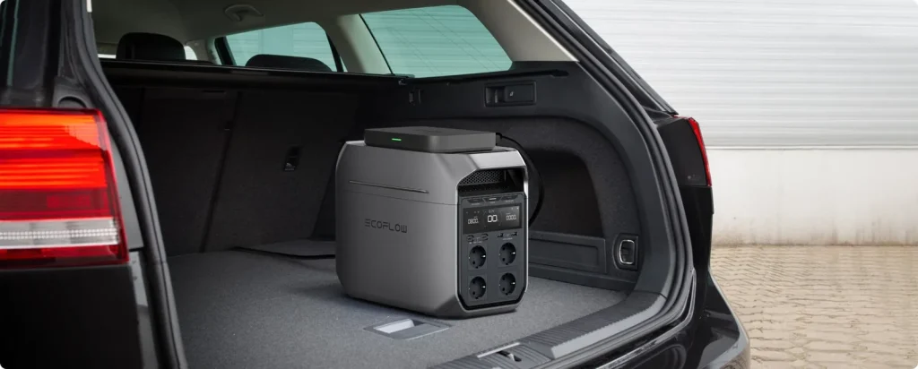 An EcoFlow DELTA 3 Plus in a car boot with an Alternator Charger on top