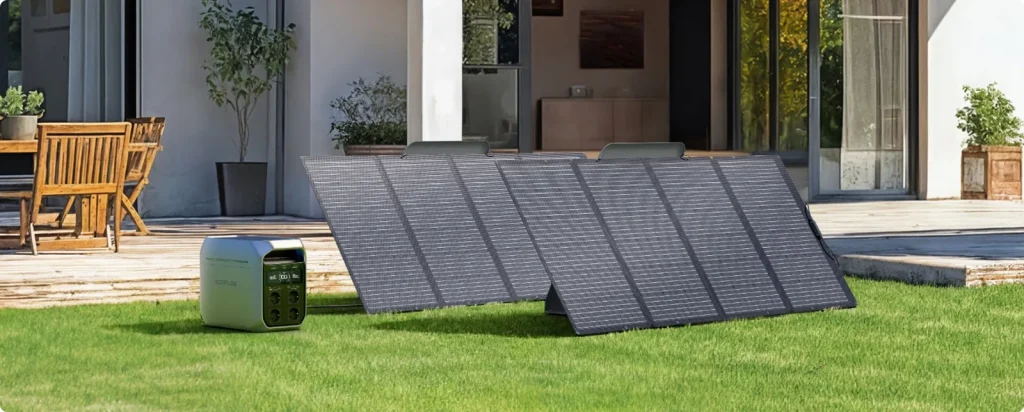 An EcoFlow DELTA 3 Plus on a lawn near a house charging from two solar panels