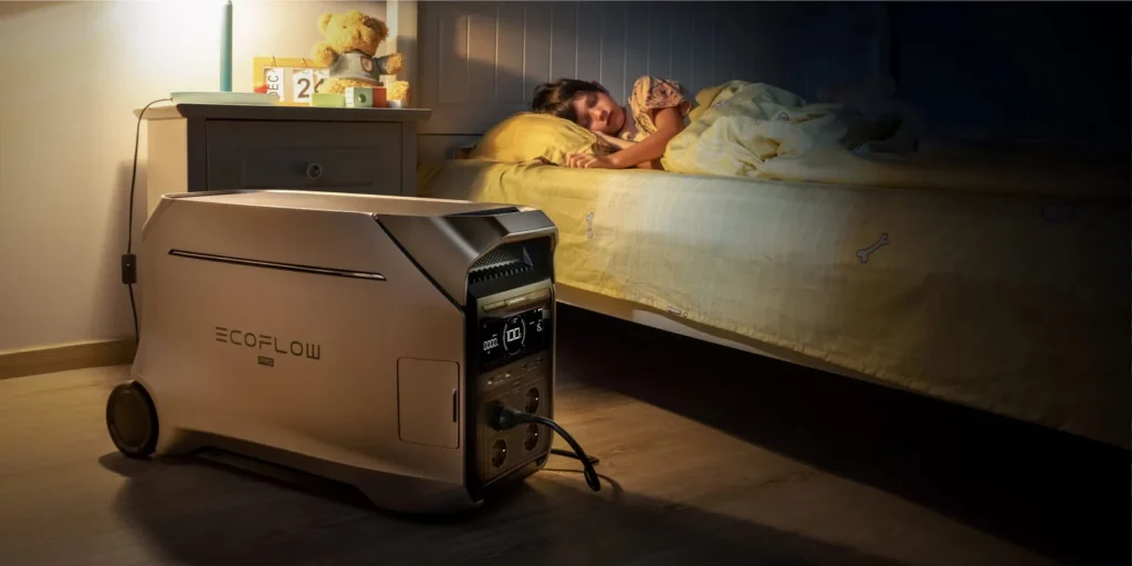 EcoFlow DELTA Pro 3 з розетками Schuko стоїть біля ліжка дитини, що спить